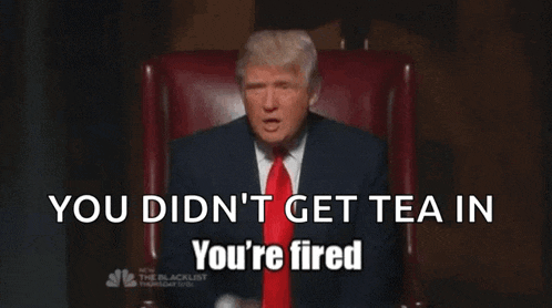 a man in a suit and tie says you did n't get tea in you 're fired while sitting in a chair