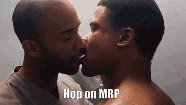 a couple of men kissing with the words hop on mrp below them