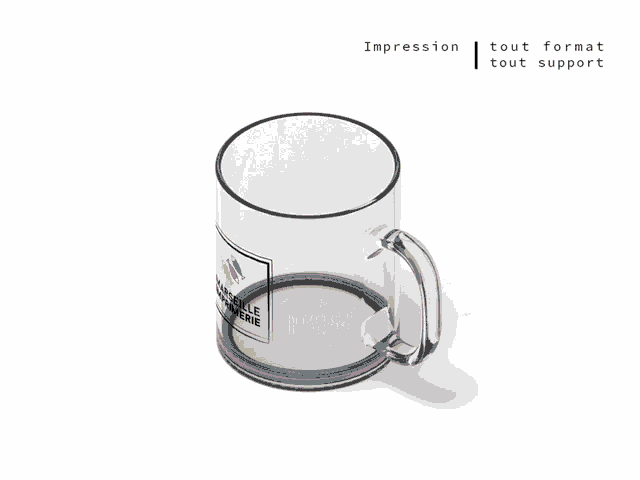 a clear glass mug with a logo for marseille imprimerie on it