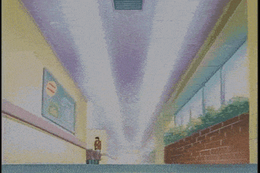 a person walking down a hallway with a sign that says 11