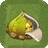 a yellow object is sitting on top of a green carpet .