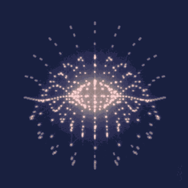 a fireworks display with a blue background and a few white dots