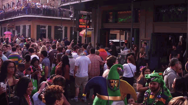 a crowd of people are gathered in front of a sign that says ' dirty dancing '