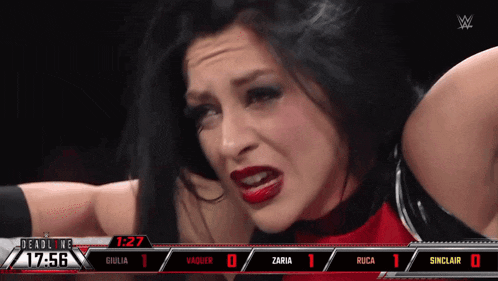 a female wrestler is on a screen that says deadline 7:46