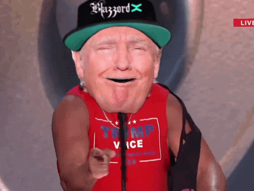 a man wearing a hat that says blazzard is pointing
