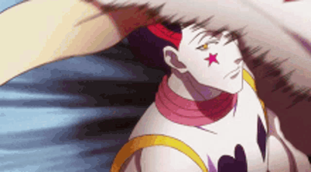 a close up of a cartoon character with a red and white star on his face