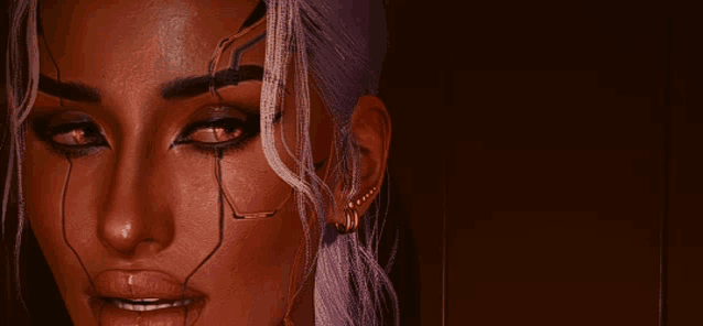 a close up of a woman 's face with a red eye