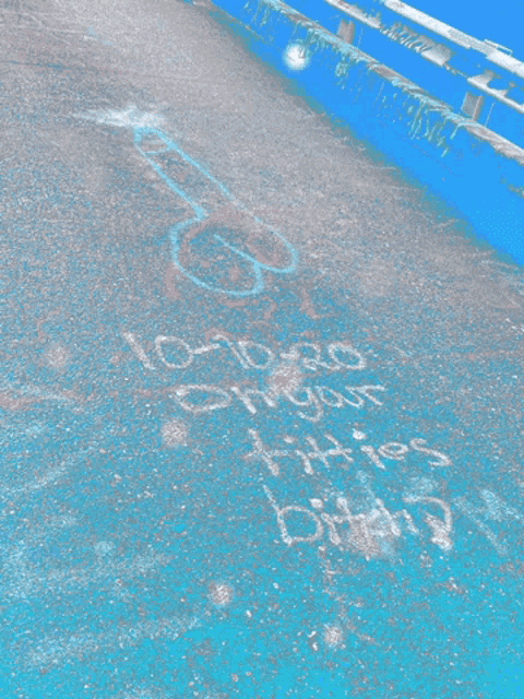the word bitchy is written on the ground with chalk