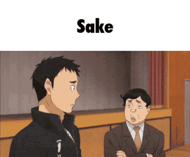 a man in a suit and tie is talking to another man in a room with the word sake on the bottom .
