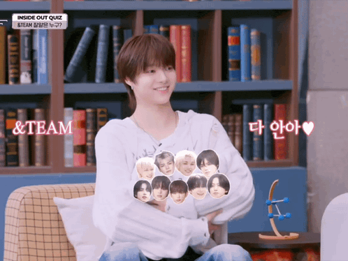 a young boy is sitting on a couch with a sign that says inside out quiz