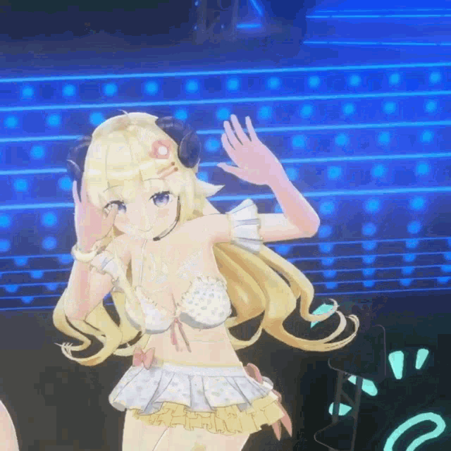 a girl in a bikini with horns is dancing on a stage