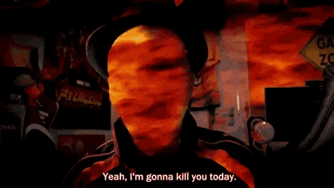 a man with flames coming out of his face is saying yeah i 'm gonna kill you today