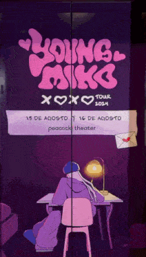 a poster for a young mike tour shows a person sitting at a desk