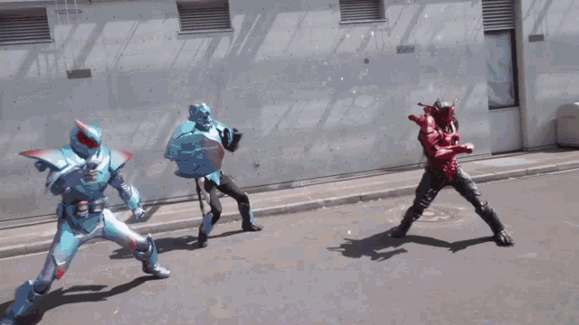a group of superheros are fighting on the street
