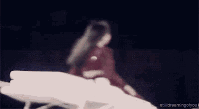 a blurred image of a woman with the words stilldreamingofyou below it