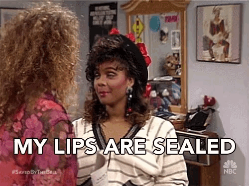 two women are standing next to each other and one of them is saying my lips are sealed