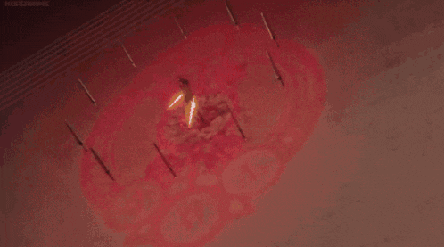 a bunch of swords are coming out of a hole in the ground