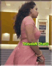 a woman in a pink dress is standing in front of a sign that says ' thiruda n chat '