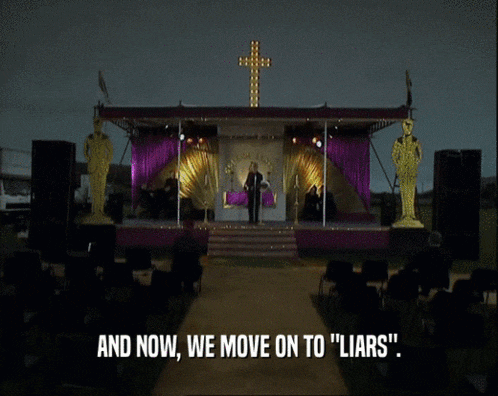 a man stands on a stage with the words and now we move on to " liars " below him