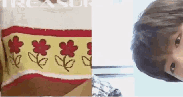 a picture of a towel with flowers on it and a picture of a person 's face .