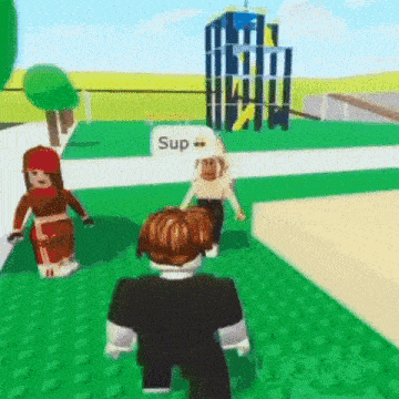 a man and a woman are playing a video game on a green field .