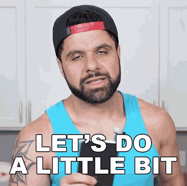 a man with a beard is wearing a blue tank top and a hat and says let 's do a little bit