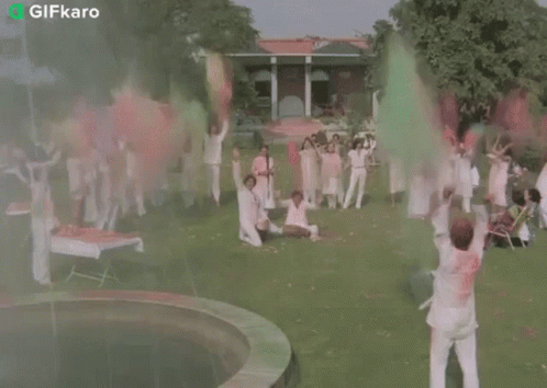 Throw Colored Powder In The Air Gifkaro GIF - Throw Colored Powder In The Air Gifkaro Lets Party GIFs