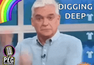a man is digging deep in front of a rainbow