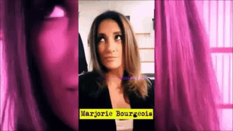 a woman is standing in front of a pink curtain with the name marjorie bourgeois on the bottom .