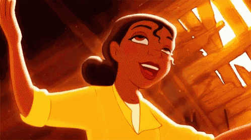 a close up of a cartoon character from the princess and the frog with her arms in the air .