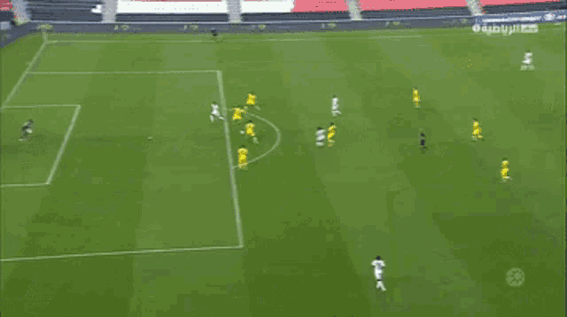 a soccer game is being played on a field that says adib on the sidelines