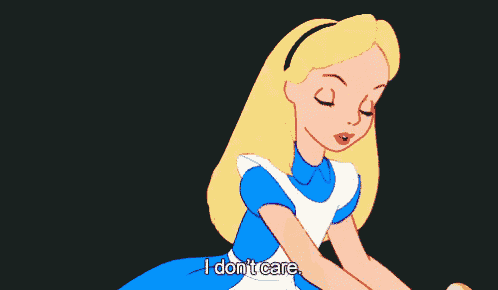 alice from alice in wonderland is holding a piece of bread and saying i don 't care