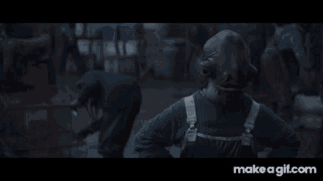 a make a gif.com screen shows a person wearing overalls and a sweater
