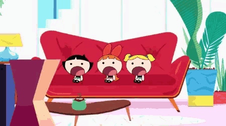 three cartoon characters sitting on a red couch with their mouths open .