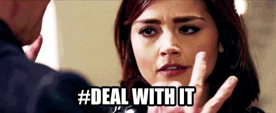 a woman is making a peace sign with her hand while a man looks on and says `` deal with it '' .