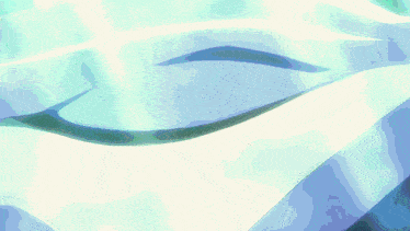 a close up of a blue and white eye