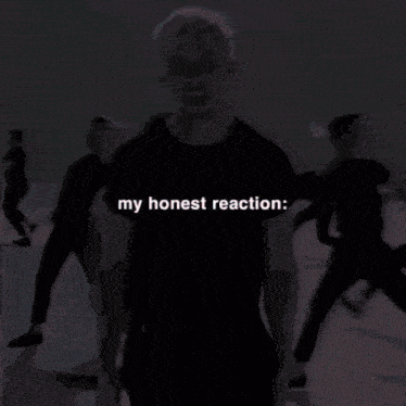 a man wearing a black shirt with the words my honest reaction on it