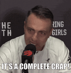 a man talking into a microphone with the words " it 's a complete crap " written below him