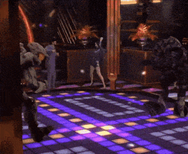 a group of people are dancing on a dance floor that has purple lights on it