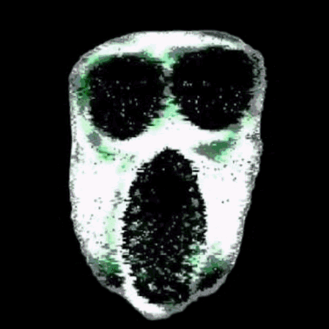 a glitch effect of a skull with green and purple colors