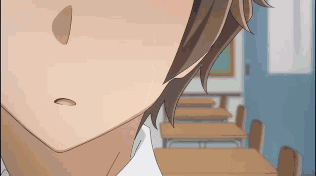 a close up of a person 's face in a classroom with wooden desks