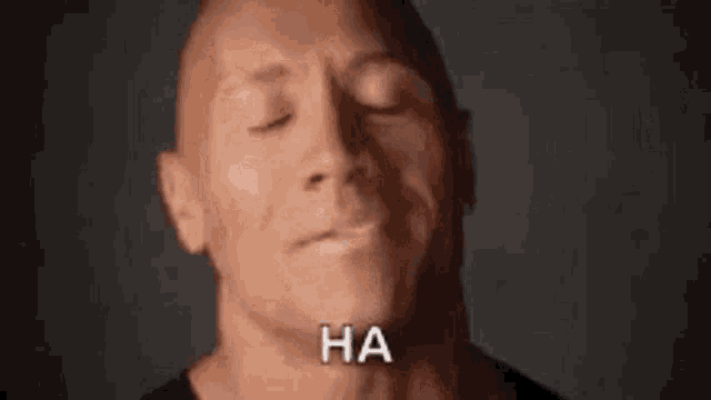 a close up of a man 's face with the words hey it 's gonna ha