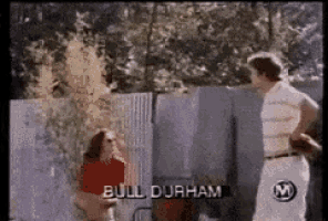 a man and a woman are standing next to each other with the name bull durham on the bottom