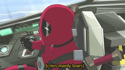 deadpool is sitting in the driver 's seat of a car and says " cries manly tears " .