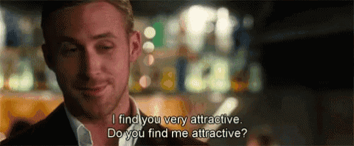 a man in a suit is talking to another man and says `` i find you very attractive .