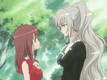 two anime girls are standing next to each other
