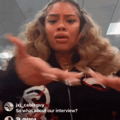 a woman is making a funny face while talking on a live stream