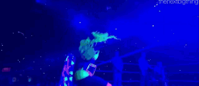 a glow in the dark pumpkin with a monster face on it