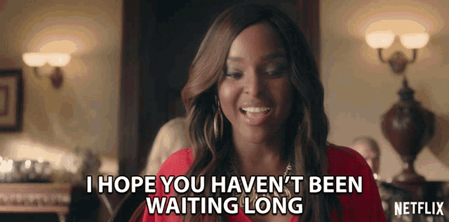 a woman is smiling and says i hope you haven 't been waiting long