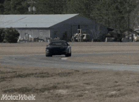 a car is driving down a road with motorweek written on the bottom right